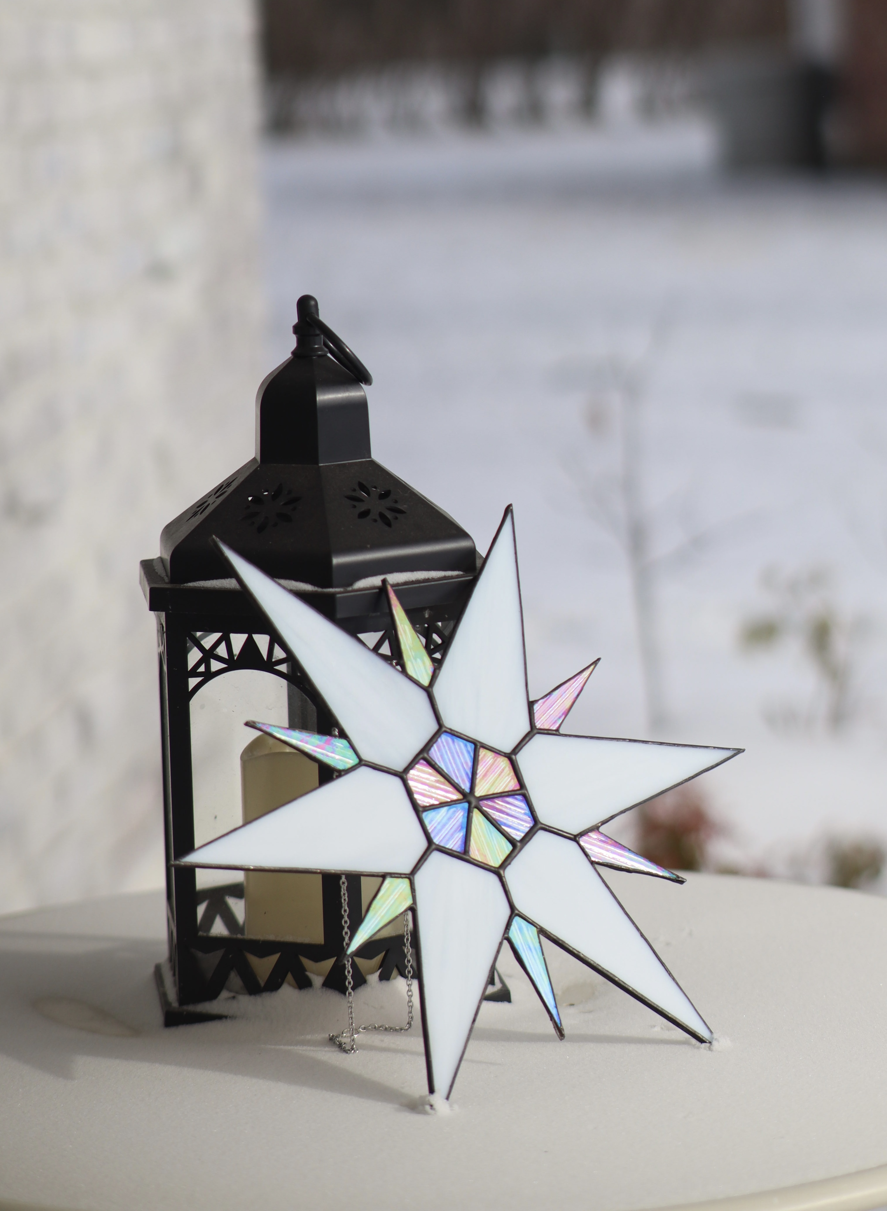 Stained Glass Star in Winter Snow